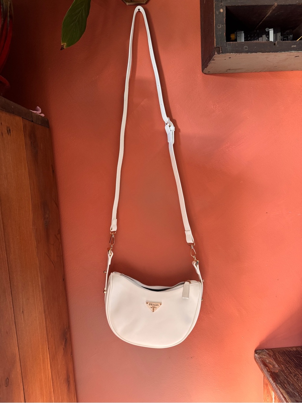 Prada Cream Leather Crescent Crossbody with Gold Hardware